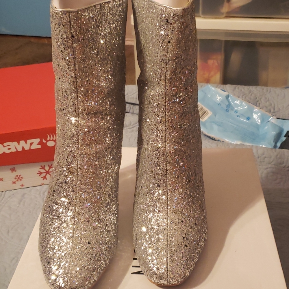 Women silver ankle boots.